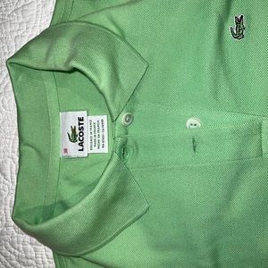 Lacoste sleeveless fitted pique golf or tennis shirt size 38